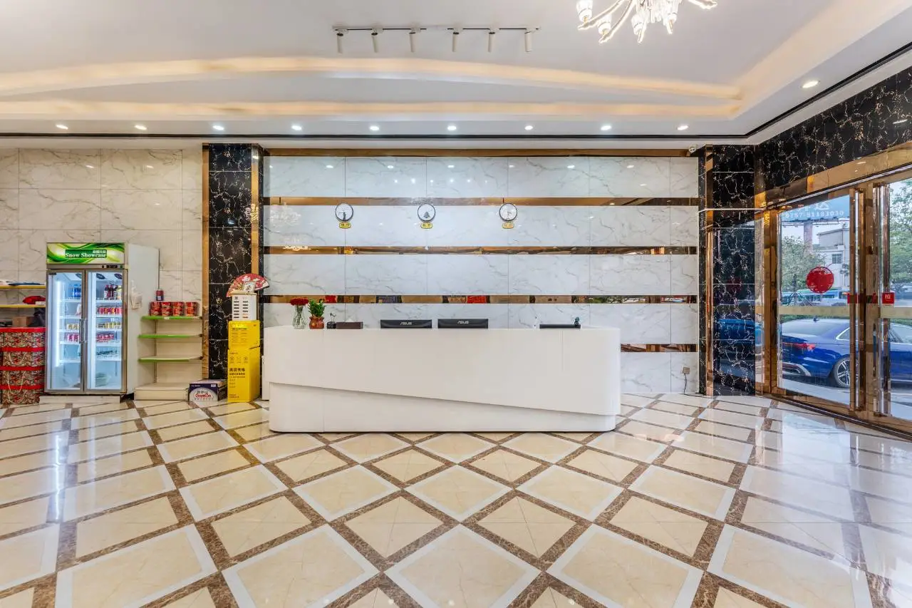 合意精品酒店(佛山火车站沙堤机场店) 7