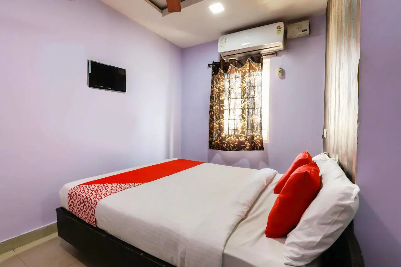 OYO 65201 Raghava Guest House 7